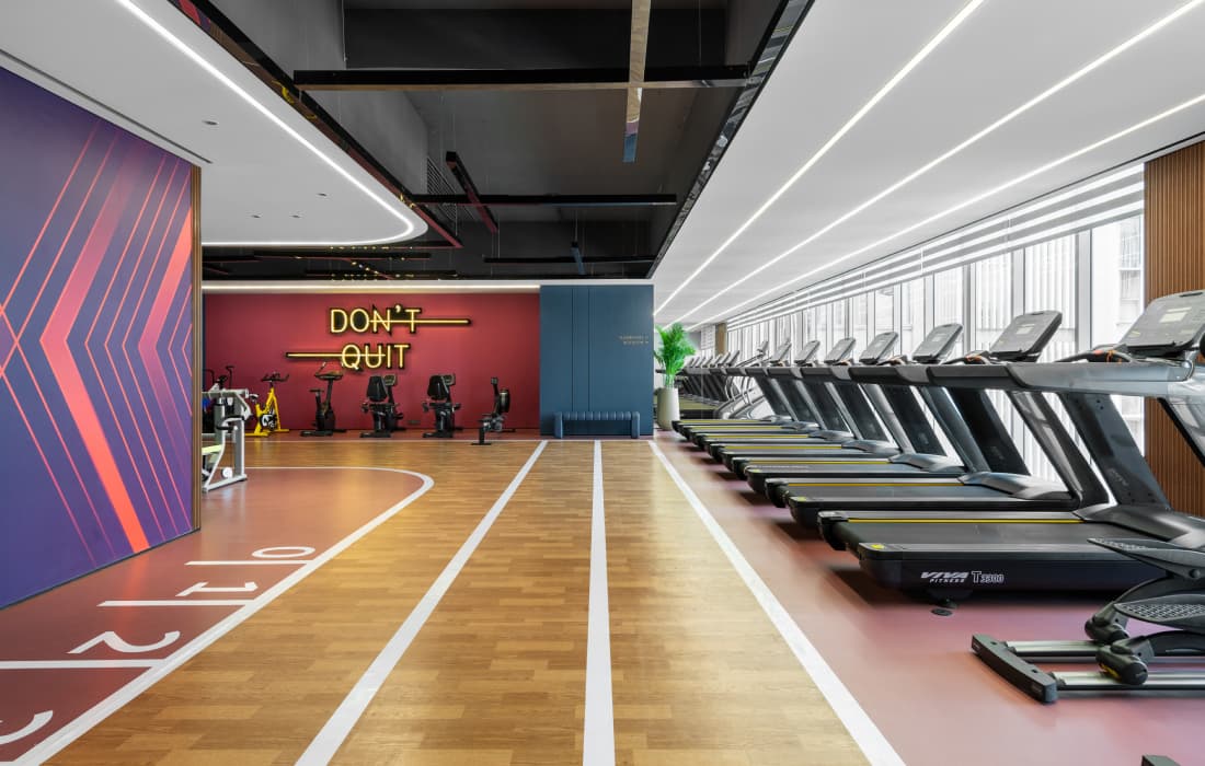 Gymnasium featuring state-of-the-art fitness equipment at Piramal Revanta